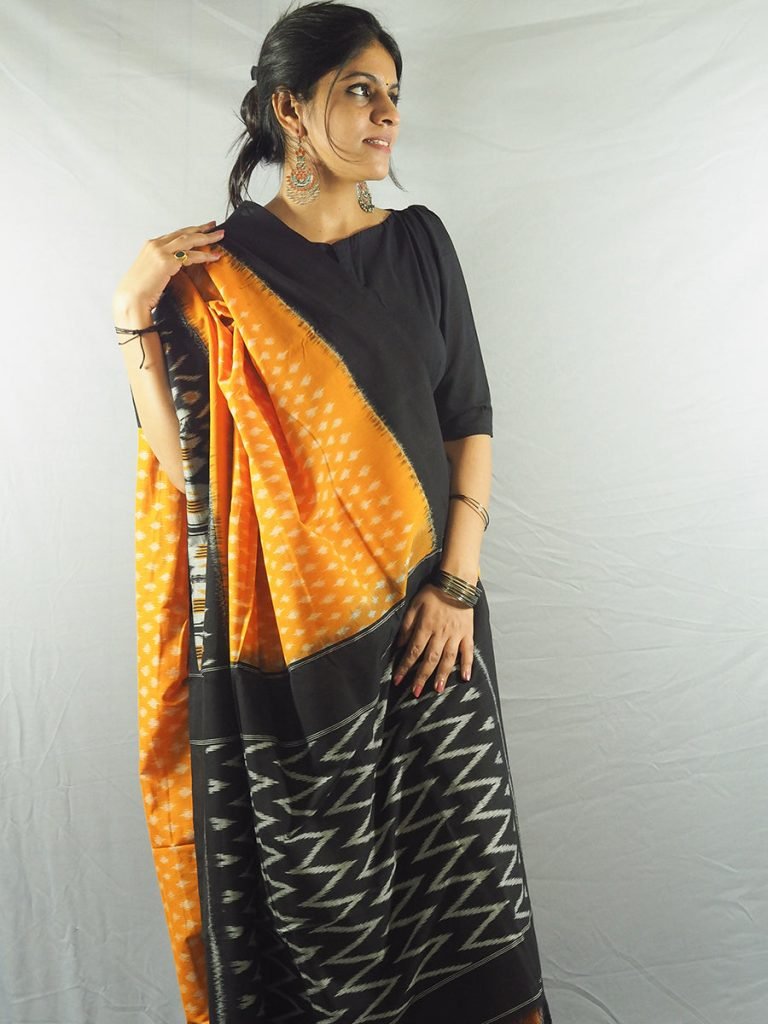 Alternative view of Nizami Orange Mustard and Black Ikkat Saree
