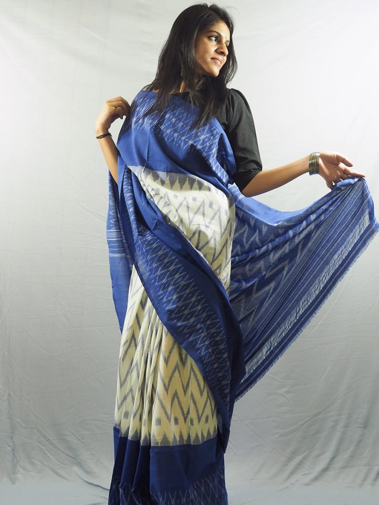 Nizami Blue and White Ikkat Saree — photograph 3